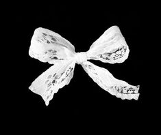 a white bow on a black background