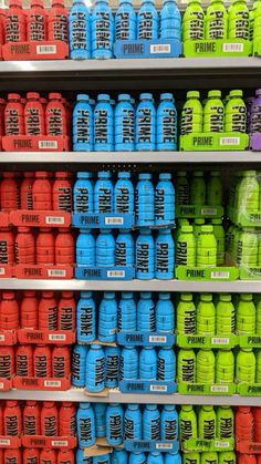 the shelves are filled with different colored plastic containers