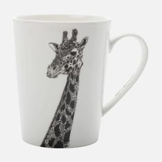 a white mug with a giraffe drawn on it's face and neck