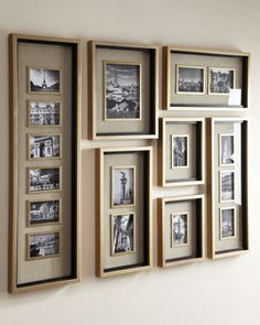 a group of framed pictures hanging on the wall