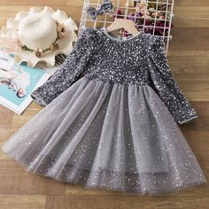 This Long Sleeves Sequin Top Glimmering Princess Party Dress is made of high-quality fabric, very soft and comfortable to wear. It is suitable for girls' birthday parties, Christmas Day, or New Year's Eve. The shining sequins on the top will make your girl look like a princess in this dress. Features: Sequin design. Full sleeve design. Mid-calf length. Comfortable to wear. Elegant and classy. Fabric & Care: Made of high-quality cotton fabric, viscose, and mesh. Hand wash is preferred. Do not ble Gaun Tulle, Princess Costume Kids, Tutu En Tulle, Girls Knitted Dress, Girls Winter Dresses, Kids Party Dresses, Shiny Dresses, 파티 드레스