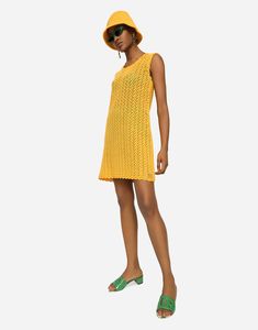 Short mesh-stitched crochet dress: Yellow 5-gauge knit Removable slip dress Button fastening at the back of the neck The piece measures 76 cm from the shoulder seam on a size IT 40 The model is 175 cm tall and wears a size IT 40 Made in Italy Dolce Gabbana Dress, Sleeveless Short Dress, Crochet Summer, Versace Outfit, City Dress, Dress Yellow, Dolce E Gabbana, Summer Beach Wear, Knit Mini Dress