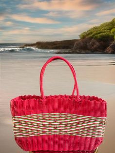 Elevate your beach style with our Woven Plastic Beach Bags. Expertly crafted from durable, lightweight plastic, this spacious tote features a chic checkered pattern that effortlessly combines elegance and functionality. The sturdy woven handles ensure comfortable carrying, making it perfect for all your beach essentials, from towels and sunscreen to your favorite summer read. Whether you're heading to the seaside or a poolside retreat, this timeless bag is your ultimate companion for a stylish and organized beach day. Rectangular Beach Bag With Rolled Handles For Shopping, Beach Tote Bag In Plastic, Casual Beach Bags Made Of Plastic, Plastic Beach Tote Bag, Basket Beach Bag With Rolled Handles For Vacation, Multicolor Plastic Beach Bags, Summer Vacation Plastic Beach Bag, Vacation Beach Bag With Basket Shape And Rolled Handles, Summer Vacation Beach Bag In Plastic