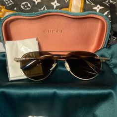 New Gucci Aviator Sunglasses. Gold Frame With Gucci Color Logo On The Side. Gg 0388s 07, 56617140. Made In Italy. Comes With Beautiful Velvet Green Case. Gucci Brown Aviator Sunglasses With Uv Protection, Gucci Classic Aviator Sunglasses, Gucci Aviator Polarized Sunglasses, Gucci Gold Aviator Sunglasses With Tinted Lenses, Gucci Aviator Sunglasses, Gucci Gold Tinted Aviator Sunglasses, Green Cases, Color Logo, Gucci Accessories