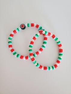 *This listing is for one of the bracelets above. please specify if you want the whole watermelon or slice watermelon.  This is a handmade bracelet with clay beads. It comes in 3 sizes small, medium, and large. You can always send me the measurement of your wrist if you want.  Any bracelet you see can be customized for an additional fee. Red Adjustable Fun Beaded Bracelets, Fun Red Beaded Bracelet, Casual Beaded Bracelets With Polymer Clay As Gift, Casual Polymer Clay Beaded Bracelets Gift, Casual Beaded Bracelets As Gift, Playful Red Beaded Bracelets, Playful Handmade Red Beaded Bracelets, Casual Polymer Clay Bracelets As Gift, Adjustable Beaded Bracelets With Fruit Design As Gift