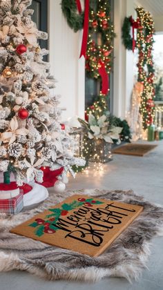 a decorated christmas tree on the front porch