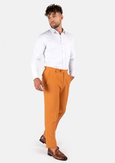 With a mustard-hue and stretch cotton fabric, you'll feel comfortable and stylish all day long in this unique custom made pants. Stand out and enjoy the compliments! Fitted Orange Workwear Pants, Fitted Orange Straight Pants, Fitted Orange Ankle-length Pants, Orange Ankle-length Workwear Pants, Fitted Mustard Bottoms For Workwear, Mustard Fitted Bottoms For Workwear, Casual Fitted Mustard Pants, Stretch Orange Pants For Workwear, Orange Stretch Pants For Workwear