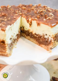 a chocolate and white cake with one slice cut out