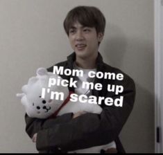 a man holding a white teddy bear with the words mom come pick me up i'm scared