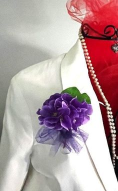 This stylish African Violet flower brooch/pin will add a touch of "pop" to any outfit, dress, blazer, or jacket. Inspired by the African Violet Flower, this simple yet elegant flower brooch is perfect for any special occasion or to rock anytime! It can be dressed up or down and is great for traditional ceremonial Delta events.   A petite-size (3 inches in length)  brooch is enough to make a statement but will not overpower your outfit!    It also makes a great birthday, wedding, or teacher gift!  Choose from a sturdy pin or magnetic backing. Flower Shaped Brooches For Spring Party, Handmade Flower Brooches For Spring Wedding, Spring Wedding Brooches With Handmade Flowers, Handmade Flower Wedding Brooches For Spring, Flower Shaped Brooch For Spring Wedding, Flower-shaped Brooch For Spring Wedding, Flower Shaped Wedding Brooch For Spring, Formal Flower Brooch For Spring, Formal Spring Flower Brooch