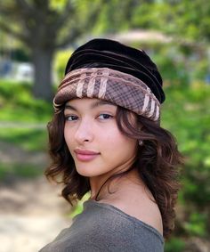 THE ANA, handmade in Seattle, WA, USA, is a charming 1920's cloche style, bias cut hat. This hat is shown in Copper Plaid Upholstery Fabric with Chocolate Velvet. The rolled brim is 3 1/2" at center front and 1 1/2" at center back. The crown height is folded into 4" with a crown diameter of 8". The brim folds over a ruched panel of velvet. Prices are as shown. These pieces are made-to-order and may be exchanged or returned for a store credit only. All sales of items with customizations or altera Plaid Upholstery Fabric, Ruff Collar, Face Mask Men, Crown Heights, Cozy Coats, Large Hats, Hat Style, Cloche Hat, Scarf Men