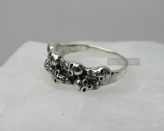 Womens Sterling silver skull ring - Skull jewelry - thumb ring - index finger ring - gifts for biker chicks *IF YOUR SIZE ISNT SHOWING, MESSAGE ME. I might be sold out and will be able to replenish shortly* Face Height: 7 mm Metal Material: Sterling Silver Finish: Oxidized Made of Sterling Silver Nothing but the best from my custom jewelry store. Email me if you have any questions. Ring Index Finger, Sterling Silver Skull Rings, Index Finger Ring, Index Finger Rings, Silver Skull Ring, Wave Ring, Index Finger, Thumb Ring, Biker Chick