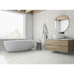 a bathroom with a white brick wall and wooden cabinet, sink, mirror and bathtub