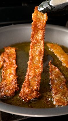 some food is being cooked in a frying pan