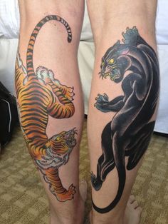 two people with tattoos on their legs and one has a tiger tattoo on the leg