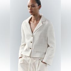 Nwt No Flaws Zara Woman Collection Blazer Made With 32% Cotton. Notched Lapel Collar And Long Sleeves. Front Flap Pockets. Textured Fabric Detail. Tonal Interior Lining. Front Embossed Metal Button Closure. Ecru | 3262/449 Outer Shell 32% Cotton 31% Polyester 31% Acrylic 6% Viscose Lining Body 76% Lyocell 24% Polyester Sleeves 100% Viscose Designer Structured Blazer For Spring, Designer White Spring Blazer, Designer Cream Blazer For Spring, Designer White Blazer For Spring, White Designer Blazer For Spring, Zara Jacket, Embossed Metal, Oversized Style, Zara Jackets