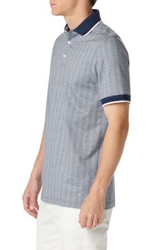 Patterned in crisp geometries, this polo made of cotton and sustainably produced lyocell brings comfort and polish to all your favorite looks. 28" length Button half-placket Spread collar Short sleeves 70% cotton, 30% Tencel® lyocell Tencel lyocell is a sustainably produced fiber made with closed-loop processing Machine wash, dry flat Imported Cotton Button-up Polo Shirt With Pockets, Modern Cotton Polo Collar T-shirt, Functional Moisture-wicking Cotton Polo Shirt, Moisture-wicking 4-way Stretch Collared Polo Shirt, Geo Pattern, Cotton Golf Polo Shirt With 4-way Stretch, Short Sleeves, Nordstrom, Bring It On