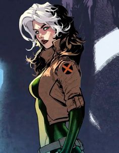 a woman with white hair and green pants standing in front of a giant black object