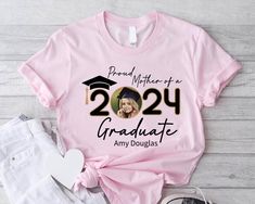 Proud Mom Of a 2024 Graduate Tshirt, Personalized Graduation Shirts, Add The Photo Graduation Shirt, Class of 2024 Family Graduation Tee HOW TO ORDER: 1.) Please check the photos and listing descriptions.  2.) Select Your items color from the drop down menu. 3.) Select your desired quantity for the item. 4.) Please Specify your design color for your shirt in the box that says "Add Your Personalization". 5. Click ADD TO CART. (You can then repeat the steps anytime you want to and add more colors Cherry Blossom Shirt, Blood Shirt, Graduation Tshirts, Paris Shirt, Graduation Shirt, Nature Shirts, Graduation Shirts, Class Of 2024, Gaming Shirt