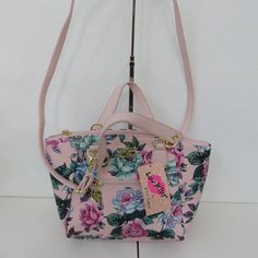 New With Tag Floral Print Faux Leather Cross Body Straps Detachable Straps Height 9 Inches X Width 9.5" Inches X Depth 5 Inches Zipper Closure Inner Two Pockets Inner Zipper Pocket Questions? Leave A Comment Below! Betsy Johnson Bags, Body Straps, Betsey Johnson Purses, Betsey Johnson Handbags, Floral Handbags, Vintage Betsey Johnson, Satchel Tote Bag, Black Leather Purse, Pink Purse