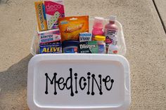 a white medicine box filled with lots of different types of medical care items on top of a carpeted floor