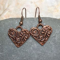 Copper Bohemian heart earrings with rustic charms. Beautifully detailed charms feature dragonflies! Lightweight earrings for casual or dressy occasions. Very pretty and versatile, these earthy minimalist earrings complement any style. Free gift packaging included, earrings are carded and in a gift bag. Customize them with your choice of hypoallergenic ear wires at checkout. To see more of my handmade Bohemian and Czech glass bead earrings, visit this link to my shop: https://www.etsy.com/shop/Je Bohemian Metal Heart Earrings As Gift, Bohemian Style Heart Earrings As A Gift, Bohemian Nickel Free Heart Earrings, Cottagecore Jewelry, Copper Heart, Dragonfly Jewelry, Reno Nv, Heart Dangle Earrings, Rustic Jewelry