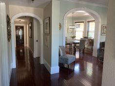 the hallway is clean and ready to be used as a living room or dining area