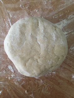 a doughnut sitting on top of a plastic wrapper