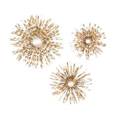 three gold and white sunbursts on a white background, each with different shapes