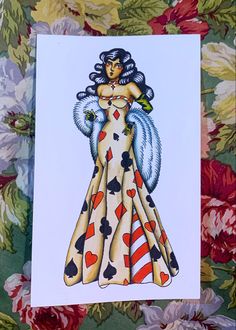 a card with an image of a woman wearing a dress and holding cards in her hands