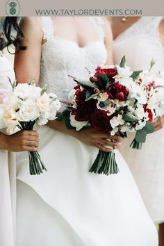 the bridesmaids are holding their bouquets with red and white flowers