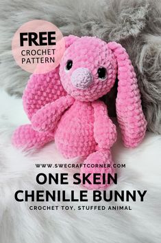 a pink crocheted bunny sitting on top of a white fur covered bed with text overlay that reads free crochet pattern