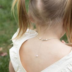 She is one lucky little lady! A petite (fits on a dime) shiny sterling silver four-leaf clover charm mingles with a gorgeous freshwater pearl and her very own special birthday gem. A wonderful and lovely reminder that she always carries her very own luck with her, on all of her adventures. Her lucky charm necklace includes: sterling clover charm (from tippy-top to bottom, a bit smaller than a dime) cultured freshwater pearl charm genuine birthday gem dangle charm [split] Details about your neckl Elegant Silver Hypoallergenic Birthstone Necklace, Elegant Pearl Necklace For Birthdays, Cute Pearl Jewelry With Pearl Charm, Pearl Jewelry For Birthday And Mother's Day, Cute Pearl Charm Jewelry, Hypoallergenic Pearl Jewelry For Birthdays, Elegant Pearl Charm Necklace For Birthday, Hypoallergenic White Gold Jewelry For Birthday, Elegant Pearl Drop Jewelry For Birthday