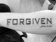 a man's arm with the word forgwen written on it in cursive font