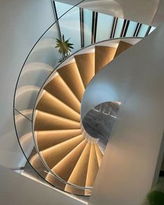 a spiral staircase in a modern home