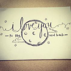 i love you to the moon and back written in cursive writing on paper