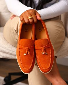 Your everyday style gets an elegant update with the Laurel Loafers. This loafer is so easy to slip-on and comes with sleek cushion insoles. Its playful pendant details adds some extra pep to your steps. Dressed up or down, the Laurel loafers can take you from day to night while looking comfortable and feeling your best. Product Details Color: Orange Slip-on Cushion insoles Pendant detail in the top area Comfortable Loafers, Flat Loafers, Women's Loafers, Suede Loafers, Loro Piana, Effortless Chic, Everyday Style, Loafers For Women, Color Orange