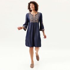 A lightly shaped denim dress with a flattering ballet neckline, shell-buttoned front, and 3/4 inch flared sleeves. Cool and relaxed, in sustainable Tencel that is finished with embroidery adds the perfect touch for a look that is both casual and sophisticated. Knee-length. Machine washable for easy care and convenience. Travels beautifully! Fall Season Knee-length Embroidered Dress, Casual Embroidered Dress With 3/4 Sleeves, Embroidered Long Sleeve Denim Summer Dress, Knee-length Denim Blue Cotton Dress, Blue Knee-length Cotton Denim Dress, Non-stretch Dark Wash Knee-length Denim Dress, Non-stretch Cotton Denim Dress With Buttons, Tencel Dress, Medium Wash Cotton A-line Denim Dress