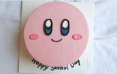 a pink smiley face with black eyes and the words happy senoi day written on it