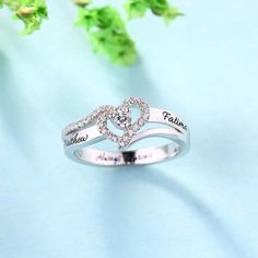 This classic Heart Shape CZ Ring is a wonderful symbol of beauty and joy. The design features heart shape which surround cubic zirconia and there is a round white cubic zirconia to be placed in the center of the heart. Optionally engrave a special message on the band. It is so shimmering and elegant that can easily match with any style of your dress codes. So, what do you hesitate for? Item specifics: Style Personalized Rings Width of Ring Band 2.5MM(0.098INCH) Thickness of Ring -- Material Ster Engraved Promise Rings, Birthstone Promise Rings, Promise Rings For Couples, Simulated Diamond Rings, Promise Rings For Her, Couple Jewelry, Personalized Rings, Cz Ring, Rings For Her