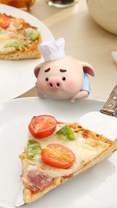 a slice of pizza on a plate with a pig figurine next to it