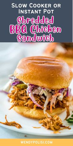 slow cooker or shredded bbq chicken sandwich on a white plate with text overlay