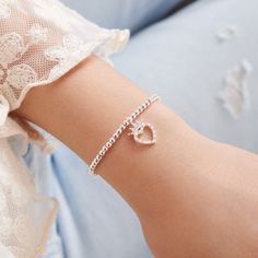 Celebrate your little princess's special day with our Kid's A Little 'Birthday Princess' Bracelet. Featuring a sparkling heart-shaped charm and a stretch design, this silver-plated bracelet will make her feel like royalty. Designed in the UK, customized in the US, and backed by a 1 year guarantee. Nickel-free and comes with free personalized gift packaging. Princess Bracelet, Wrist Stack, Jewellery Bracelets, Crown Charm, Wrist Stacks, Birthday Princess, Silver Plated Bracelet, Crown Design, Cute Bracelets