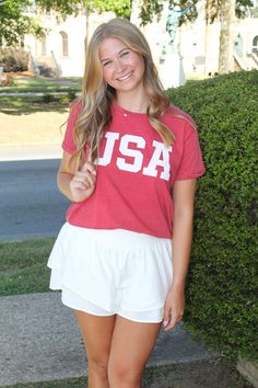 Get patriotic with our vintage washed USA Block Boyfriend Tee. Made with a soft 52% cotton and 48% polyester blend, this tee features cuffed sleeves and a high low bottom hem. Show off your American pride with this screen printed USA design! Relaxed Fit American T-shirt With Flag Detail, American Style T-shirt With American Flag And Relaxed Fit, Americana Style Cotton T-shirt With American Flag Print, Patriotic Relaxed Fit T-shirt With Flag Print, American Relaxed Fit Patriotic T-shirt, Boyfriend Tee, American Pride, Mens Outerwear, Cuff Sleeves