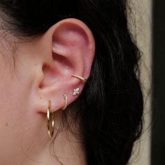 Our classic Diamond Ear Cuff is a true charmer. Designed with a hinge closure for comfort and support, you don't need a piercing to join this party. Fits snuggly around most conches. 14K Solid Gold and Kimberley Certified (Conflict-Free) DiamondsFollow us on Instagram and Facebook Elegant Everyday Ear Cuff, Classic Huggie Ear Cuff As A Gift, Classic Huggie Ear Cuff Gift, Classic White Gold Huggie Ear Cuff, Classic Pierced Huggie Ear Cuff, Elegant Tiny Hoop Piercings, Classic Hypoallergenic Huggie Ear Cuff, Diamond Ear Cuff, Party Fits