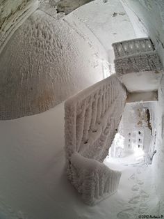 the inside of a tunnel with snow on it