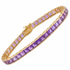 18K Gold Amethyst Art Deco Tennis Line Bracelet- 

Introducing our 18K Gold Amethyst Art Deco Tennis Line Bracelet – a timeless blend of elegance and artistry. This exquisite bracelet, crafted with care, showcases a stunning row of amethyst gemstones in an Art Deco-inspired design. Amethyst Art, Art Deco Inspired, Amethyst Gemstone, Tennis Bracelet, Tennis, 18k Gold, Amethyst, Art Deco, Design Inspiration