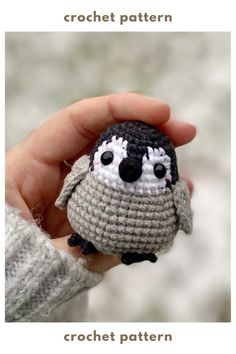 a small crocheted penguin is held in someone's hand with the caption