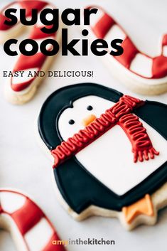 a penguin cookie with the words sugar cookies easy and delicious