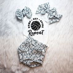 This Adorable Volleyball print is perfect for your little one going home from the hospital outfit or baby Announcement Photos. Whether they are a future Volleyball or watching a game on the couch your little one is bound to turn heads in this number.  Perfect baby shower gift for Sports enthusiast.   Choose from adorable baby shirt,bummies (diaper cover), skirted bummy, Head wrap, Hair Bow, Hat, Pants or any combination.  Comfortable Stretch fabric ensures a longevity of the fit while being brea White Letter Print Sets For Playtime, White Cotton Cheerleading Sets, White Fitted Diaper Cover For Playtime, Playful White Diaper Cover For Playwear, White Printed Sets For Playtime, White Printed Sets For Playwear, White Printed Playwear Sets, Sporty White Playtime Sets, Announcement Photos